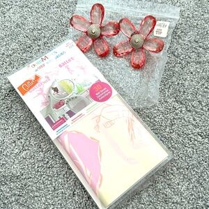 Room decals and curtain rod ends.